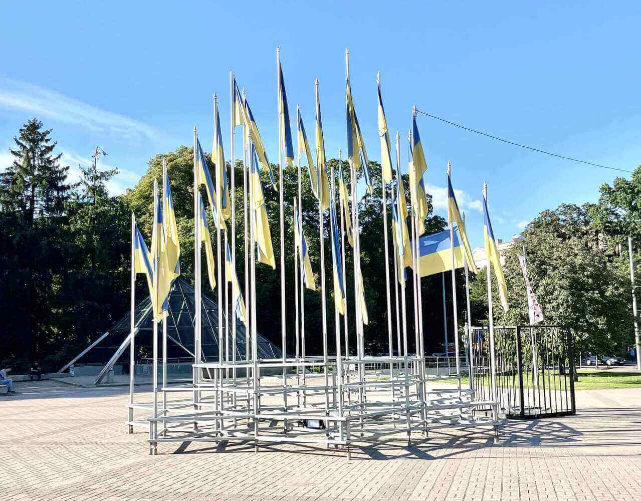 ukrainian flags in front of riga congress center