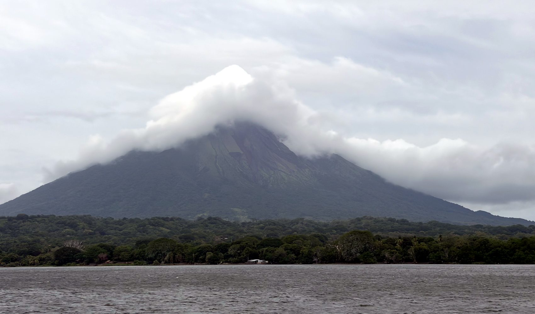 the concepción volcano rising over lake nicaragua