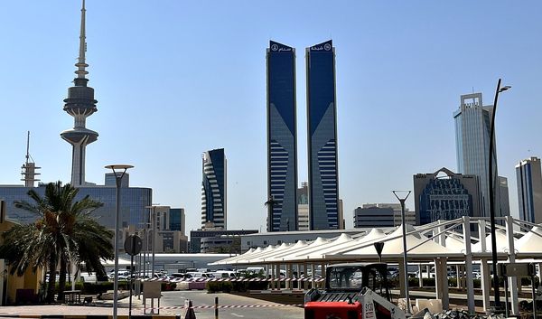 an eye-catching facade decorated with giant ceramic plates in kuwait city