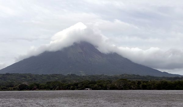 the concepción volcano rising over lake nicaragua